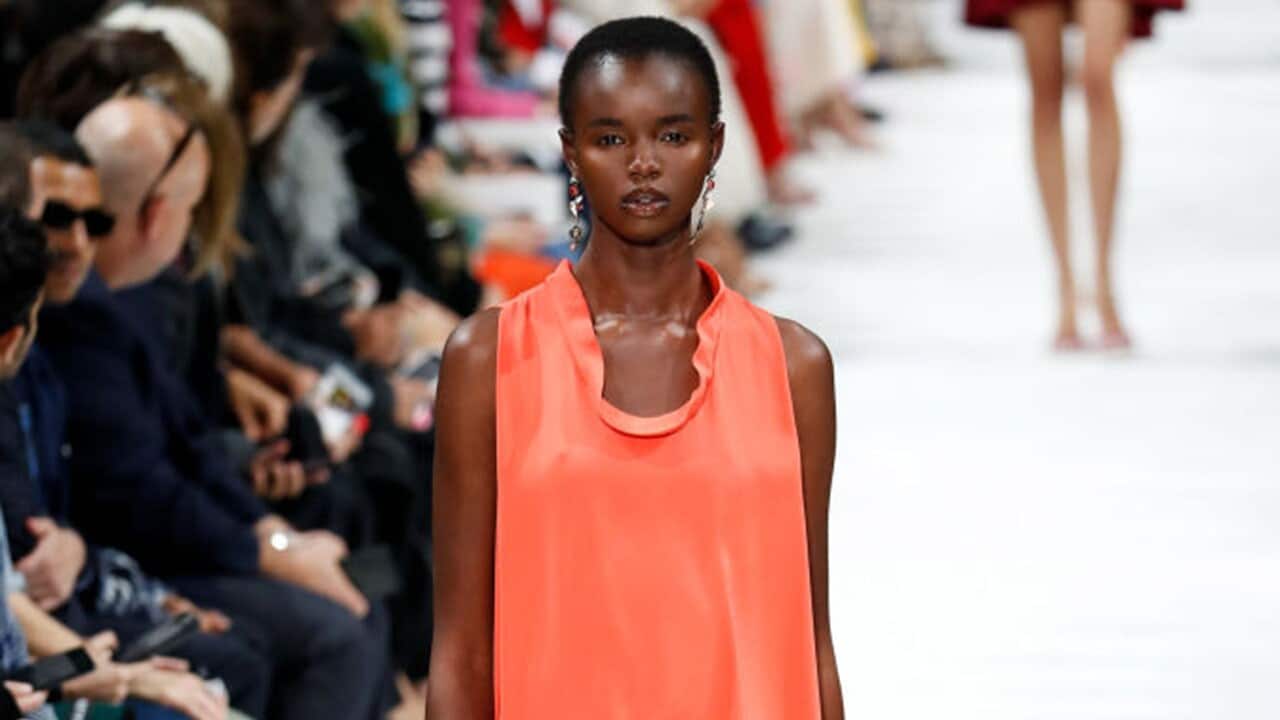 Akiima walks the runway during the Valentino show at Paris Fashion Week 2017. 