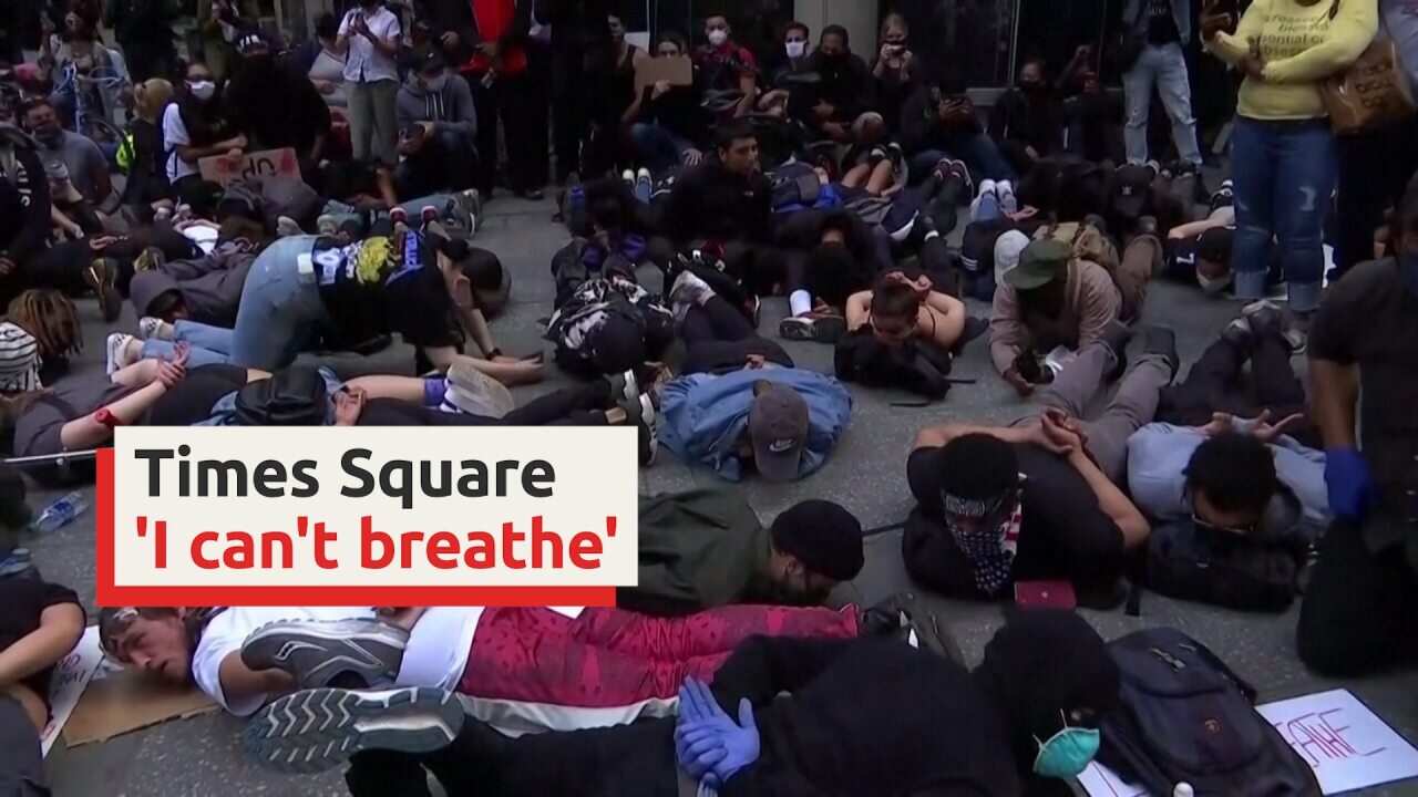 Hundreds of protesters in New York staged a die-in in Times Square