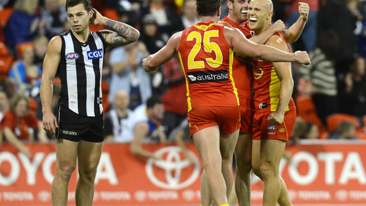 Suns edge out Magpies in AFL boilover