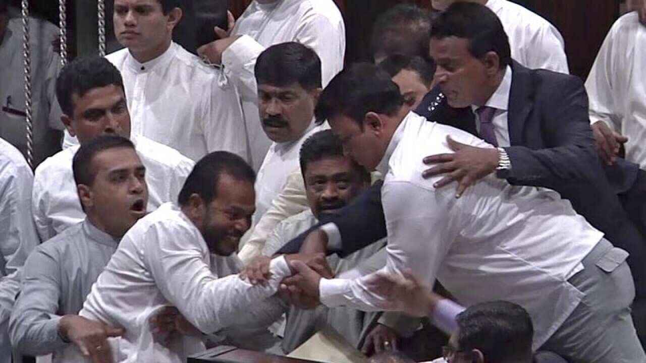 Sri Lanka's lawmakers scuffle in parliament