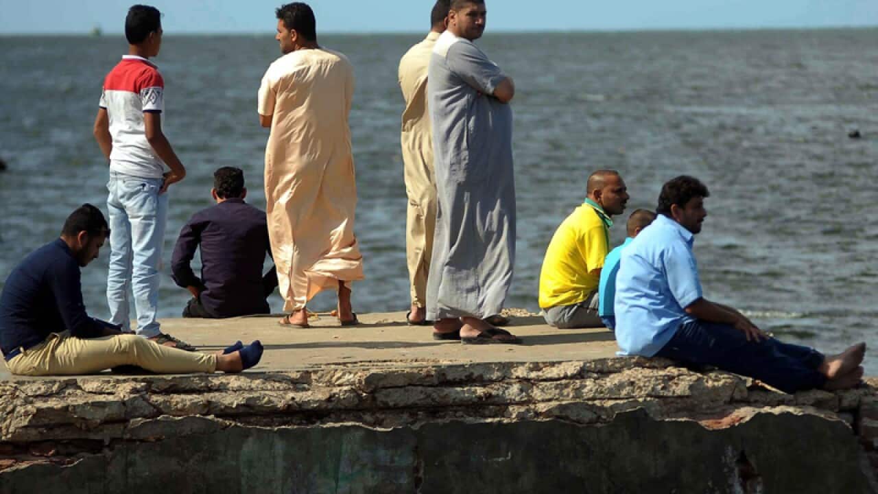 Relatives of missing people on the capsized boat