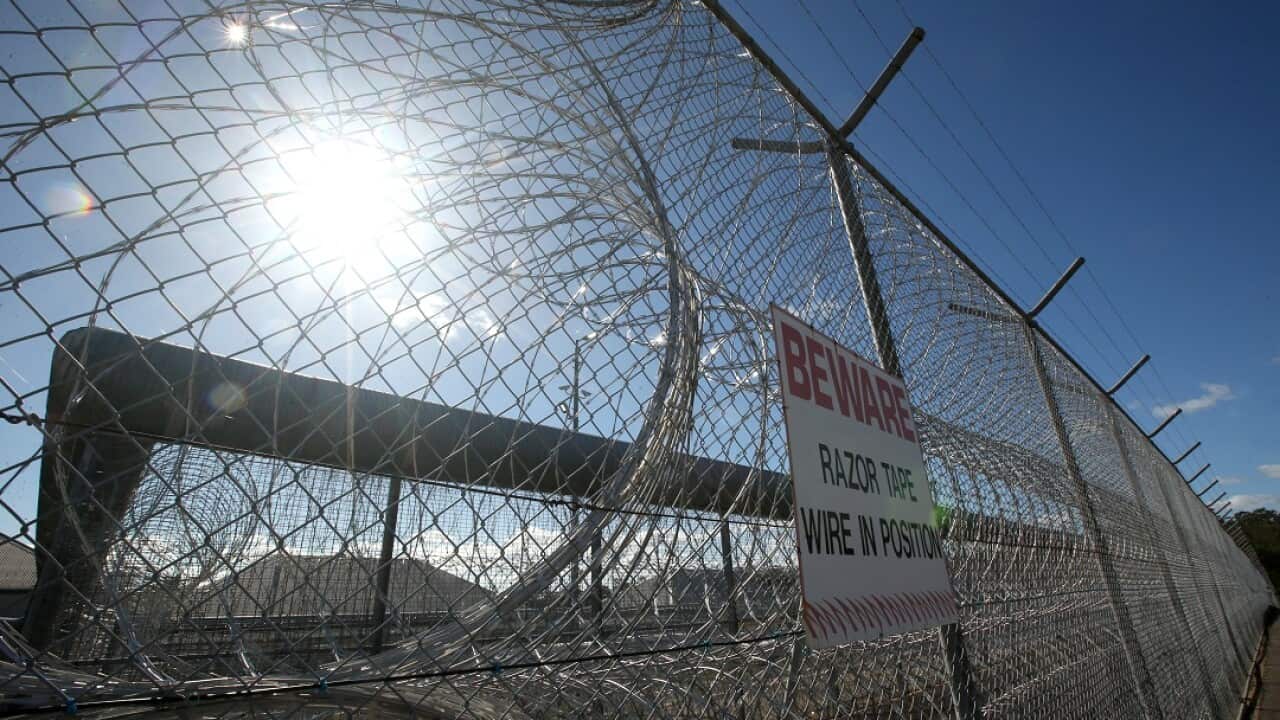 Razor wire. Prison stock at Borallon Correctional Centre Brisbane Tuesday July 3, 2018.(AAP Image/Jono Searle) NO ARCHIVING