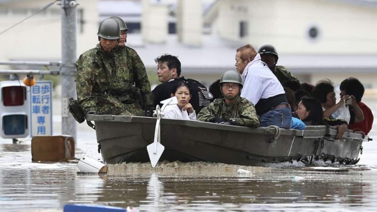 JHeavy rain and flooding has killed at least 54 people in southwestern and western Japan.
