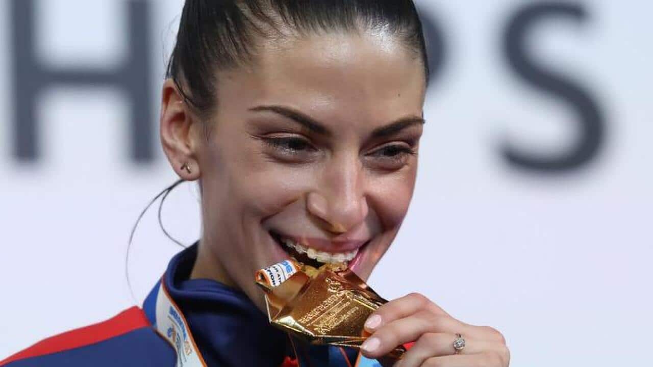 Gold medalist Ivana Spanovic of Serbia poses during the medal ceremony