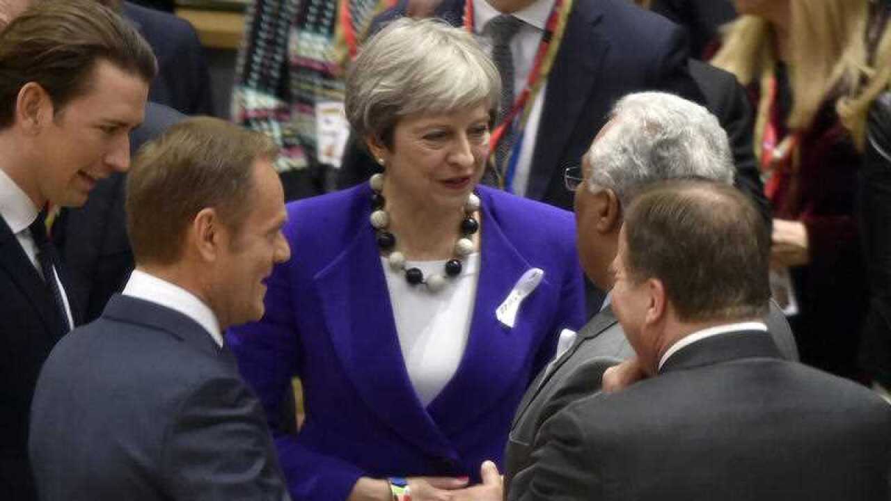 British Prime Minister Theresa May speaks with EU leaders at summit in Brussels.