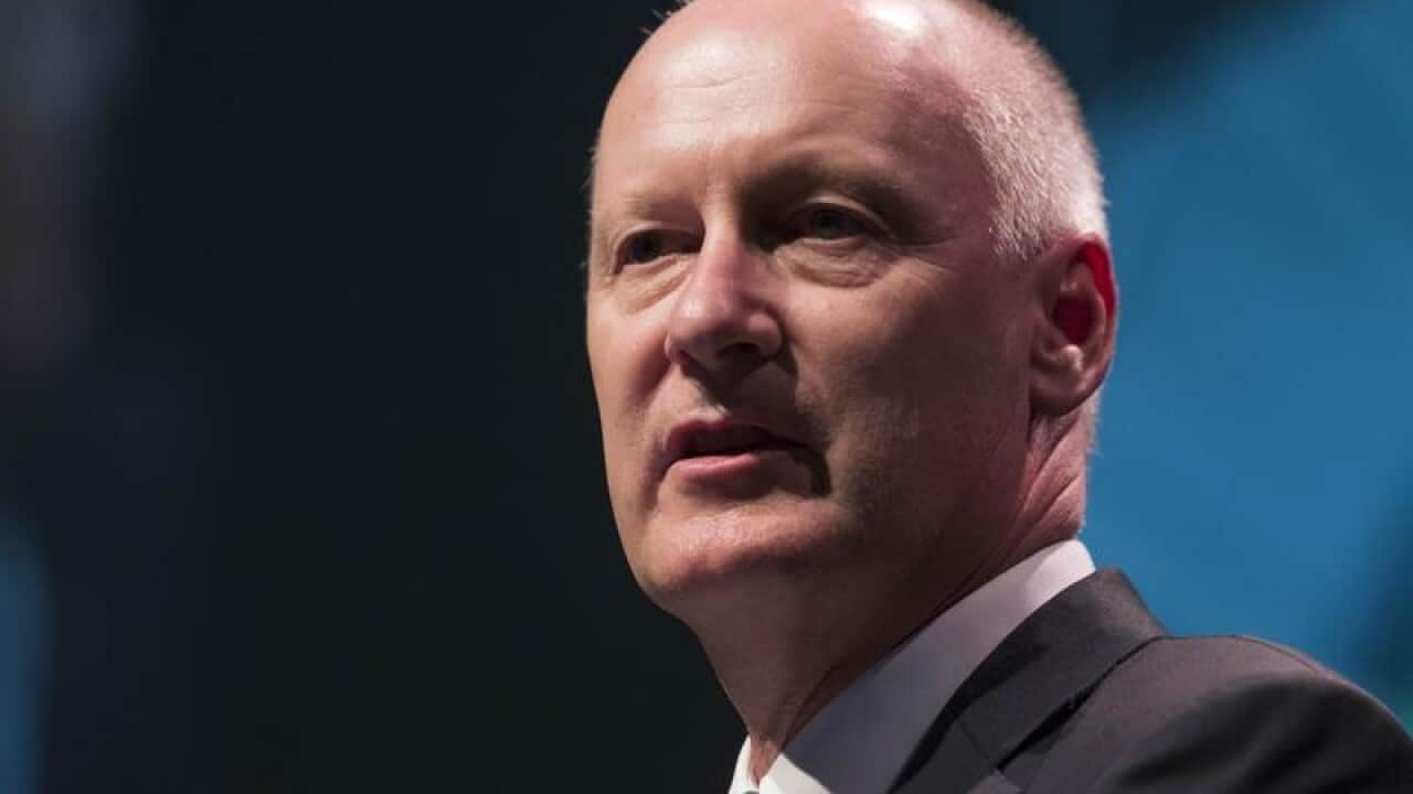 Richard Goyder speaks during an AGM.