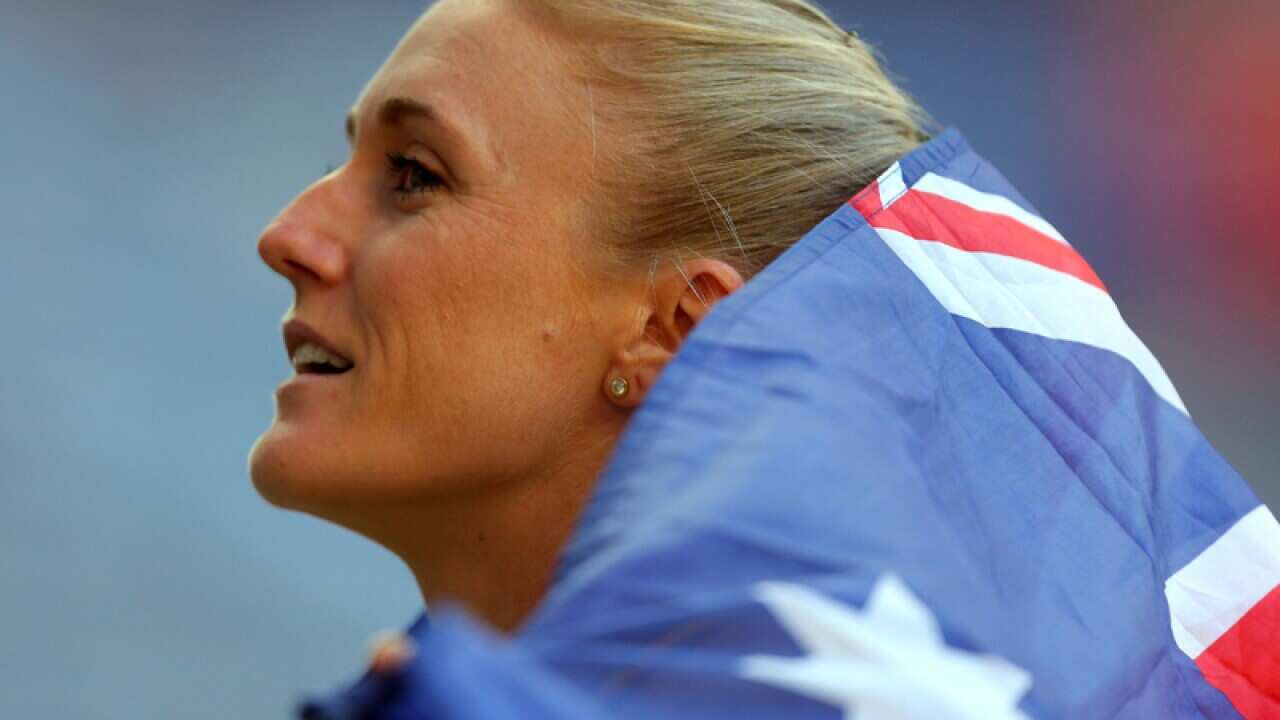 Australia's Sally Pearson celebrates her silver medal