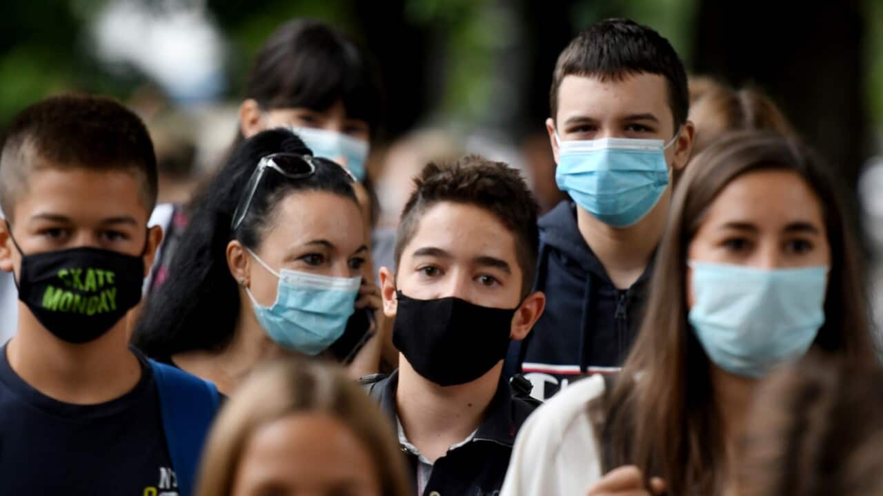 Young people wearing masks