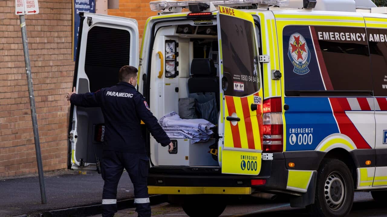 A paramedic is seen at a hospital in Melbourne, Wednesday, July 6, 2022.