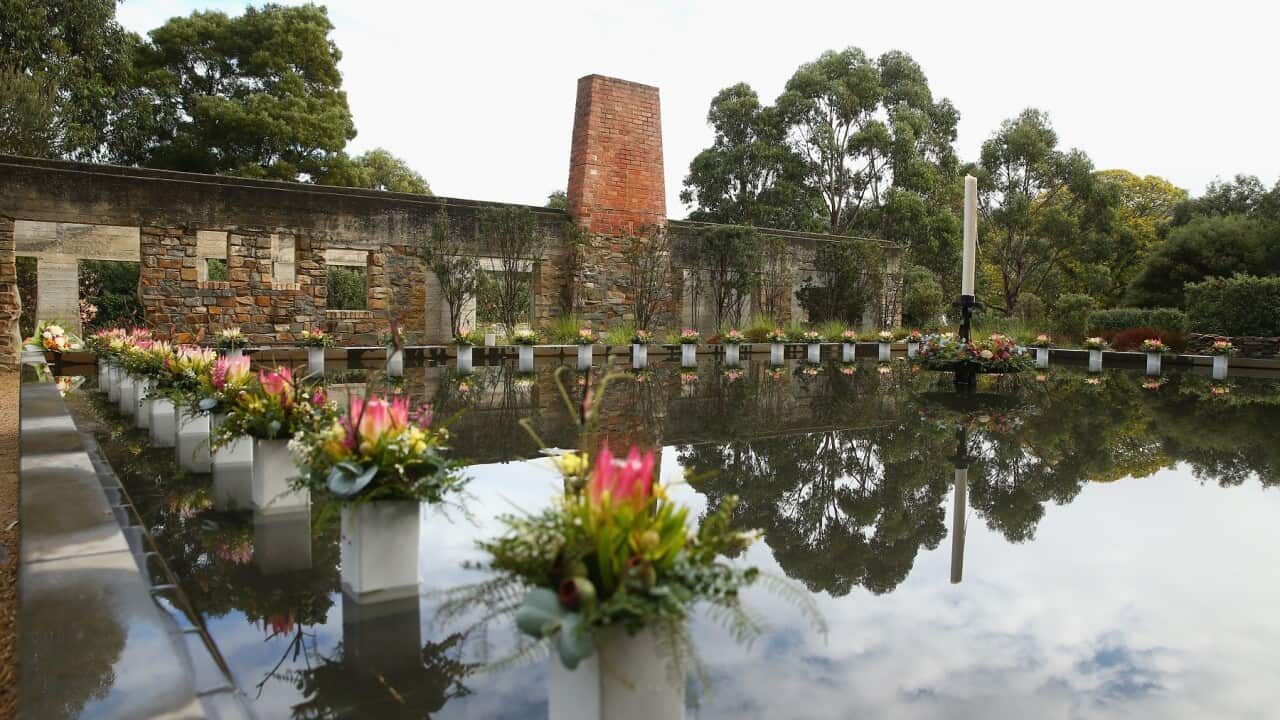Floral tributes in the Memorial Pool in 2016 in Port Arthur, Tasmania (AAP).