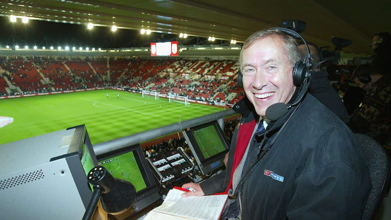 Sky television commentator Martin Tyler in the commentary box