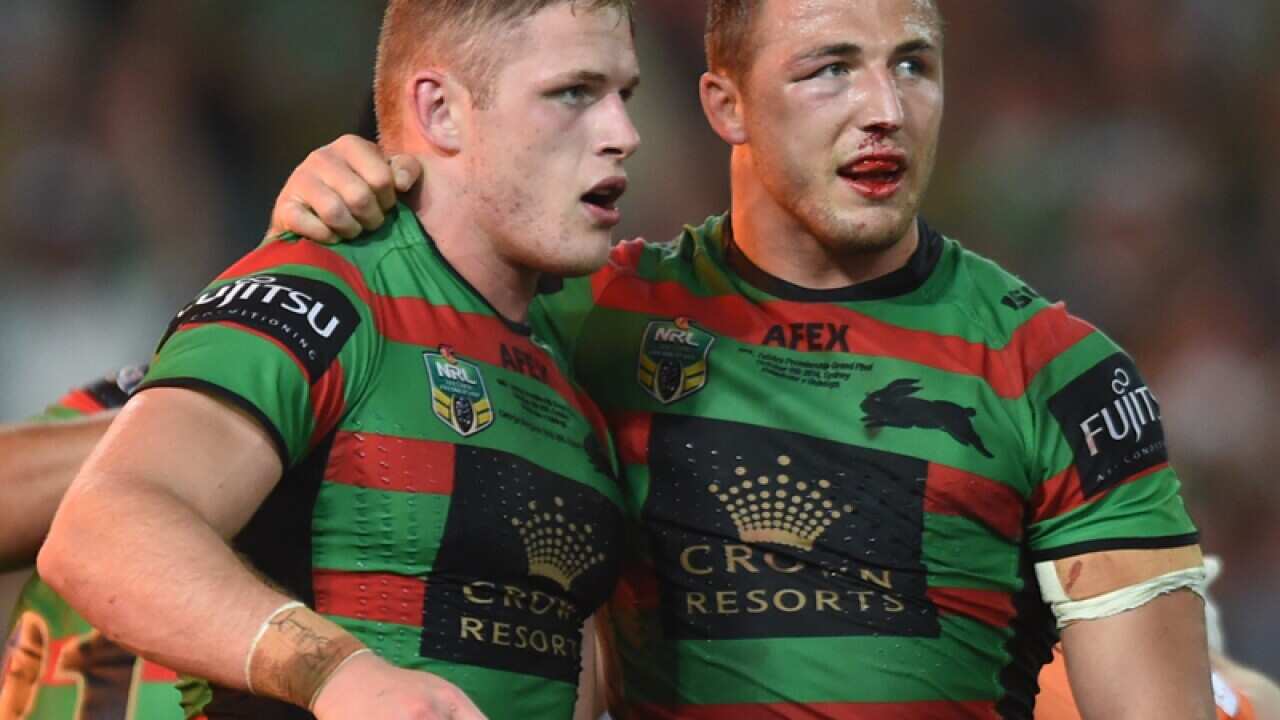 Rabbitohs' George Burgess (L) celebrates with brother Sam Burgess
