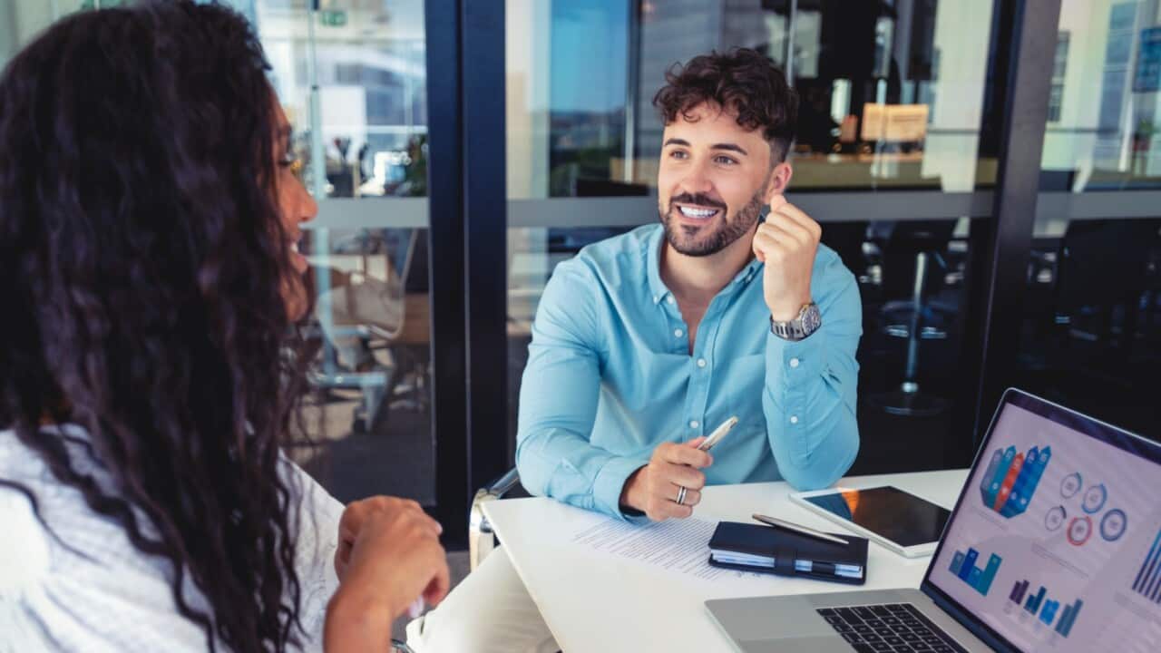 Business colleagues having a conversation