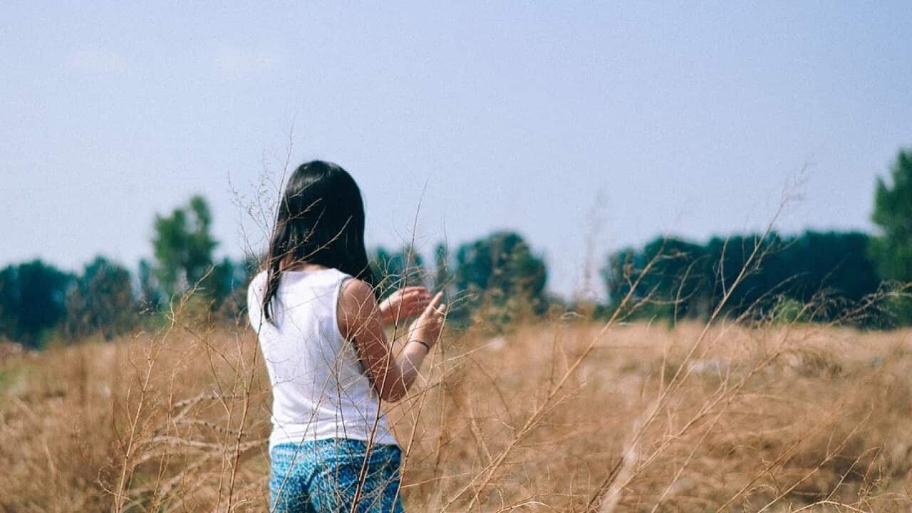 girl in the field back