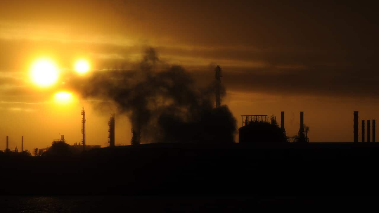Steam and other emissions rise from an industrial plant in Melbourne, Tuesday, April 29, 2014. The Abbott government's pledge to remove the carbon tax will be tested when the new Senate is formed after July 1. (AAP Image/Julian Smith) NO ARCHIVING
