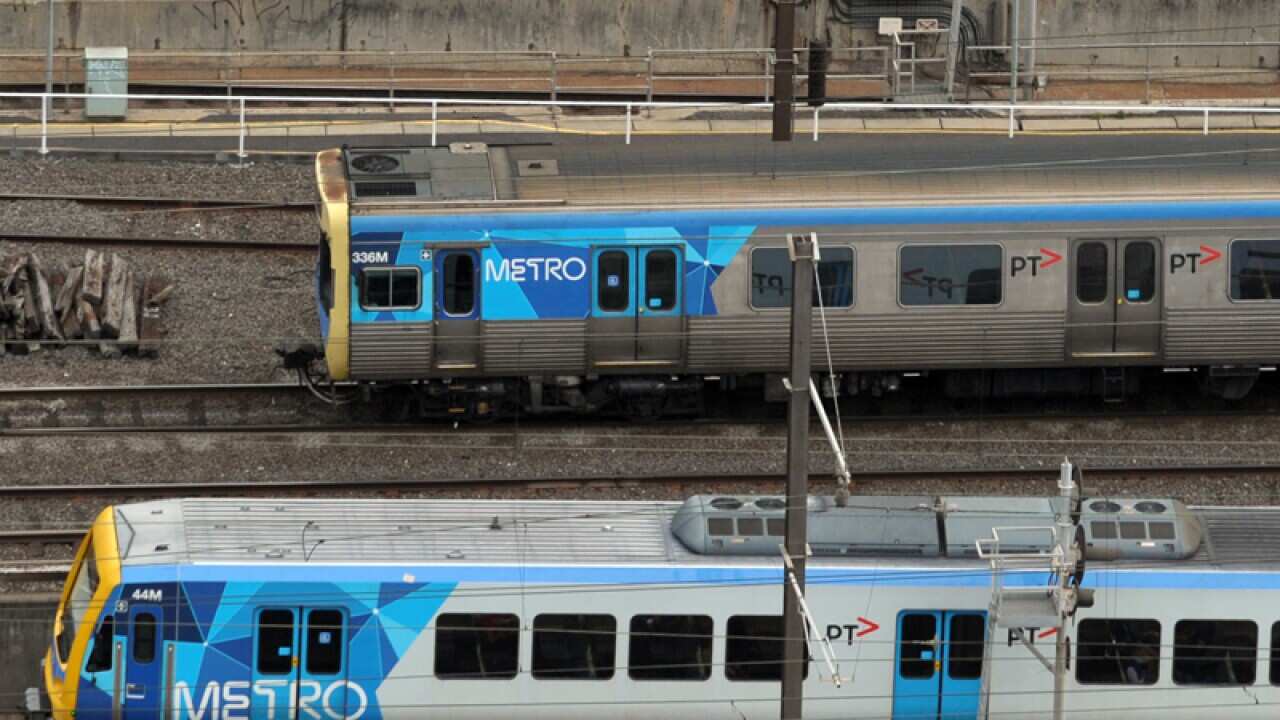 Metro and V-Line trains transit Southern Cross Station in Melbourne
