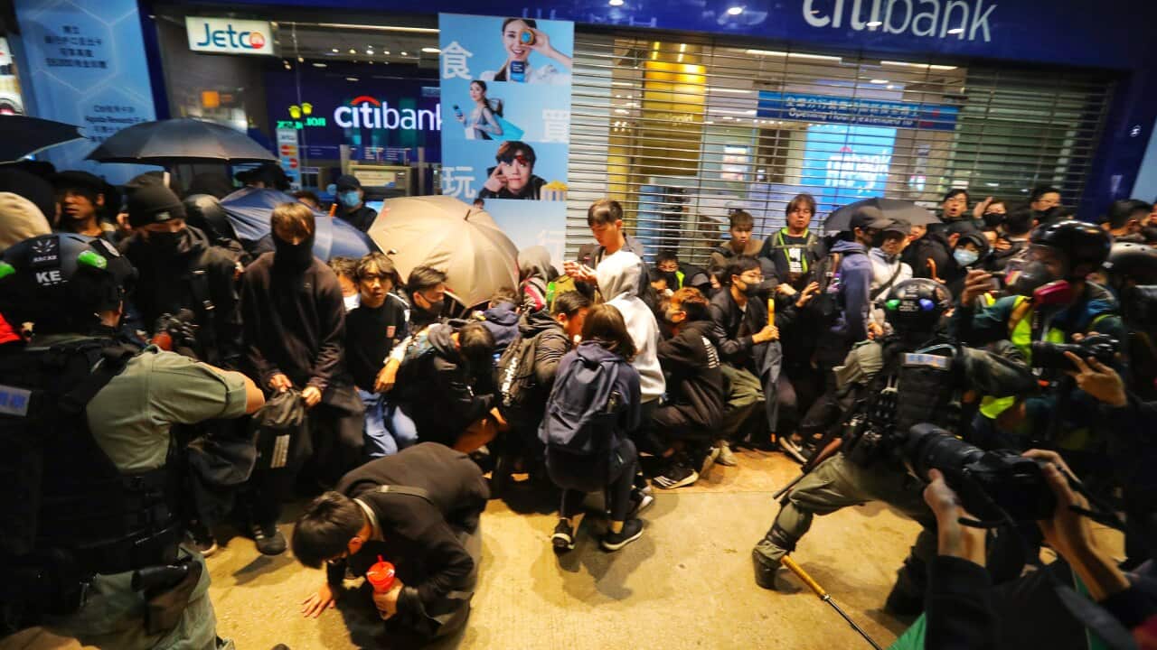 Protesters clash with police in Hong Kong's New Year's Day demonstrations.