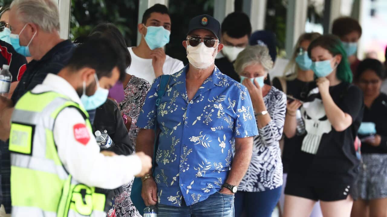 People line up for COVID-19 testing at Gold Coast University Hospital.