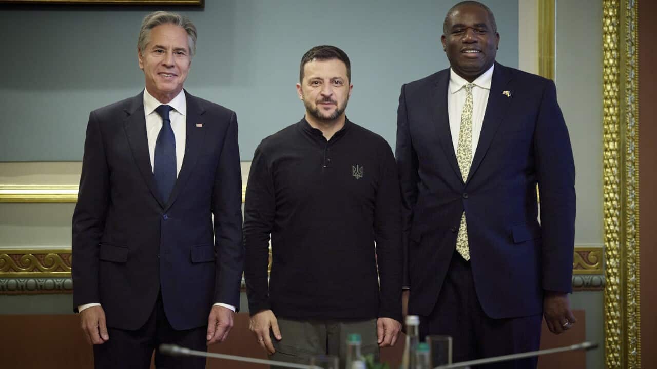 Antony Blinken, David Lammy and Ukrainian President Volodymyr Zelenskyy stand shoulder to shoulder.