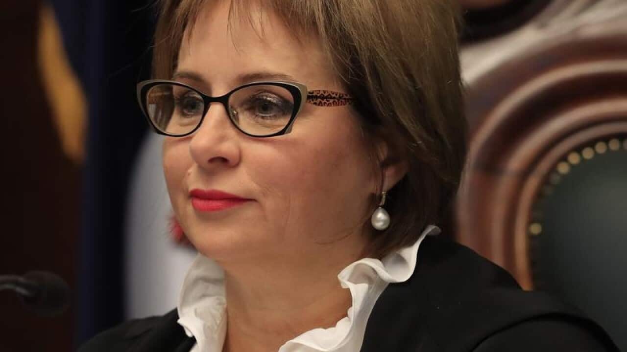 Tasmanian Speaker Sue Hickey listens to the delivery of the budget.