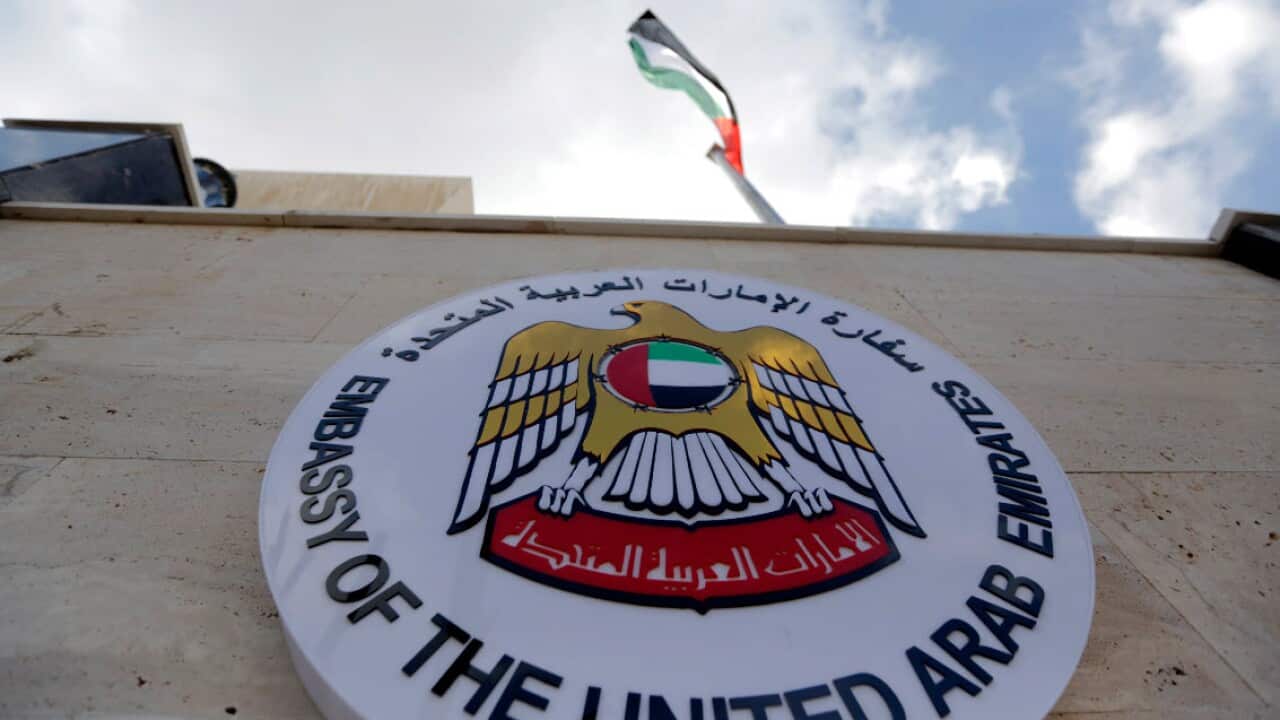 The flag of the United Arab Emirates flutter atop the embassy building (AAP)