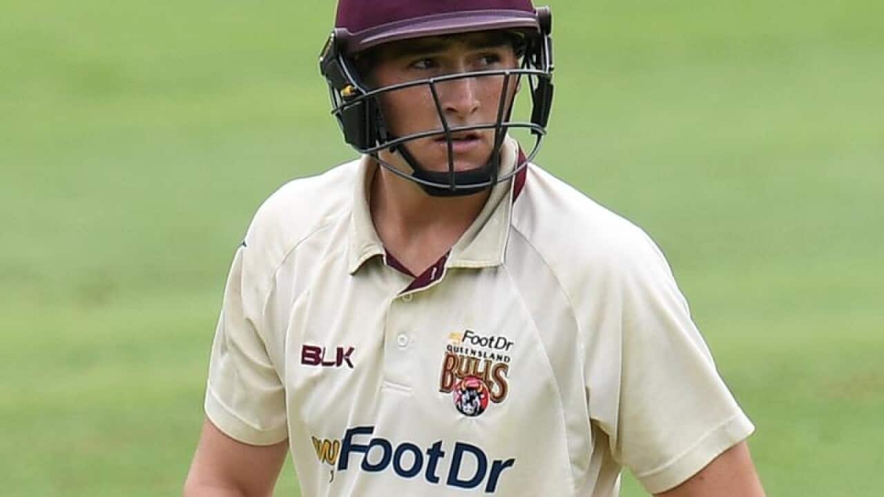 Queensland batsman Matt Renshaw departs the pitch in Brisbane.
