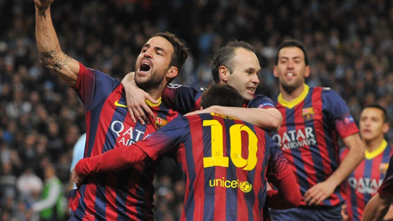 Barcelona players react during their Champions League match