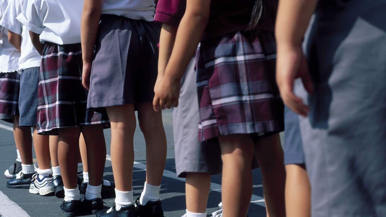 School children in a queue.