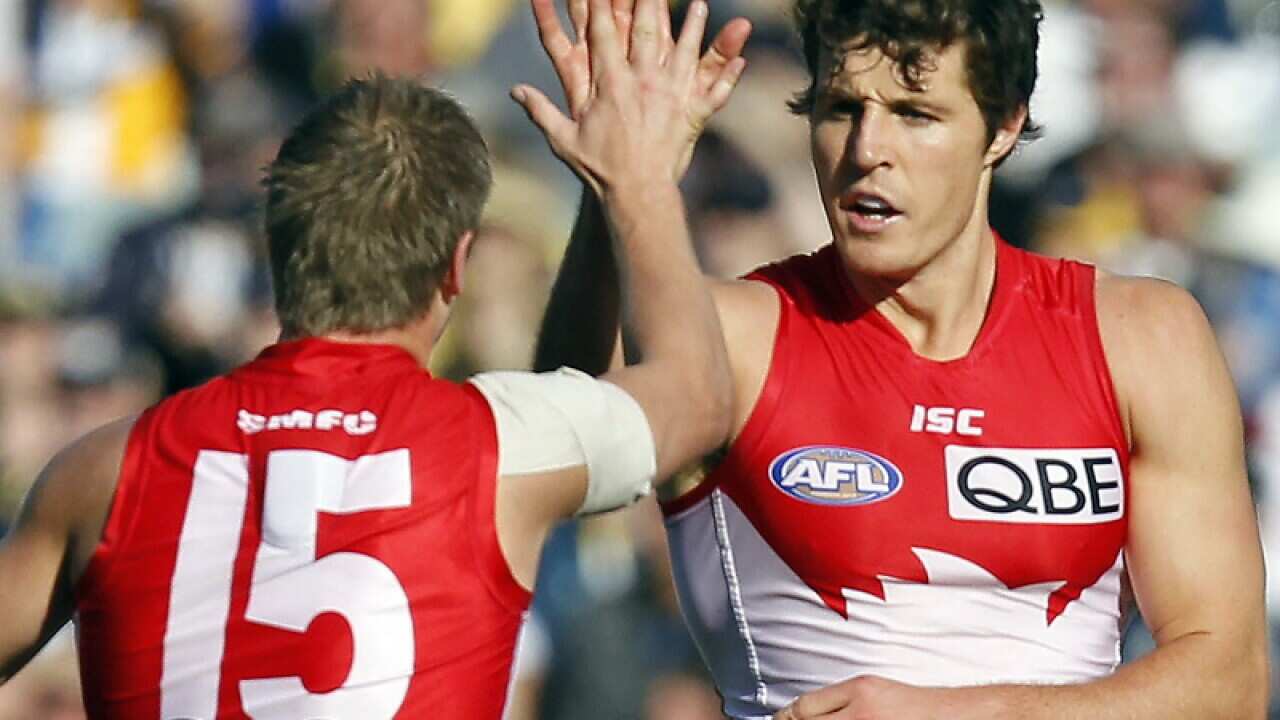 'Dogs challenge, but Swans too good