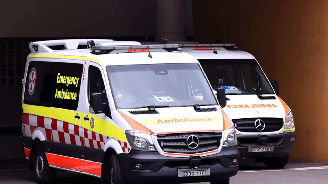 An ambulance parks at St Vincent's Hospital