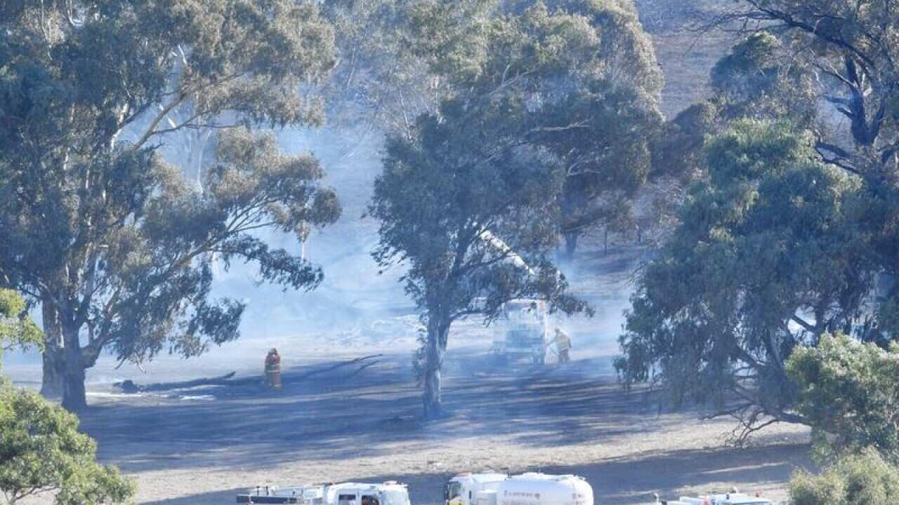 Smoke is seen from a fire burning near Birdwood in the Adelaide Hills.