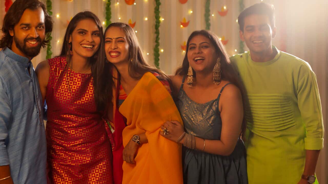 Friends celebrating Diwali together at home