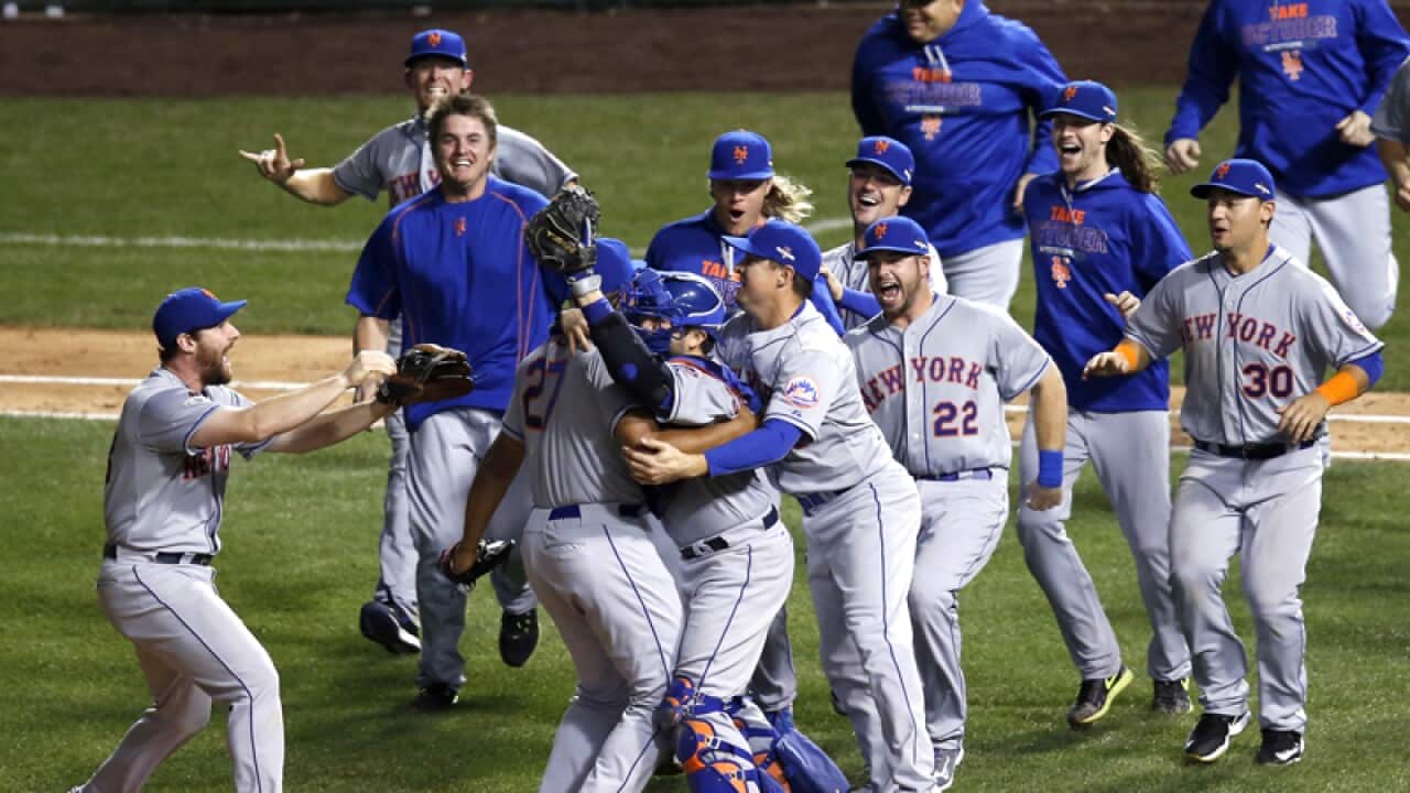 The New York Mets celebrate in Chicago