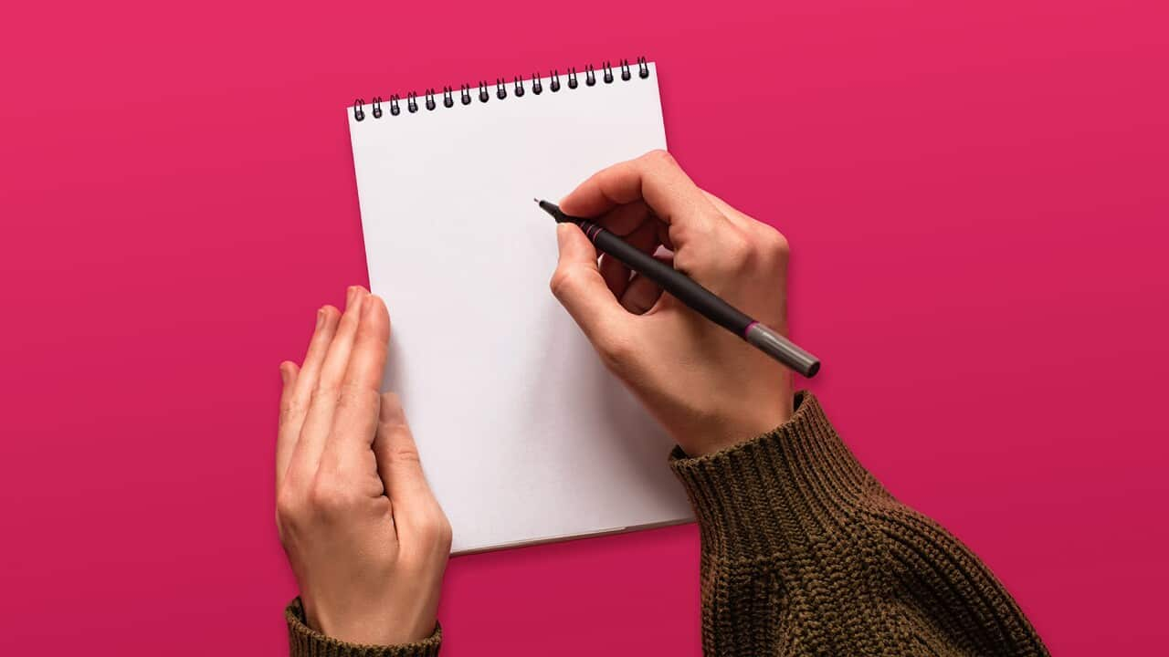 creative occupation, creativity, writing in a blank notepad on pink background, hands, goals setting background