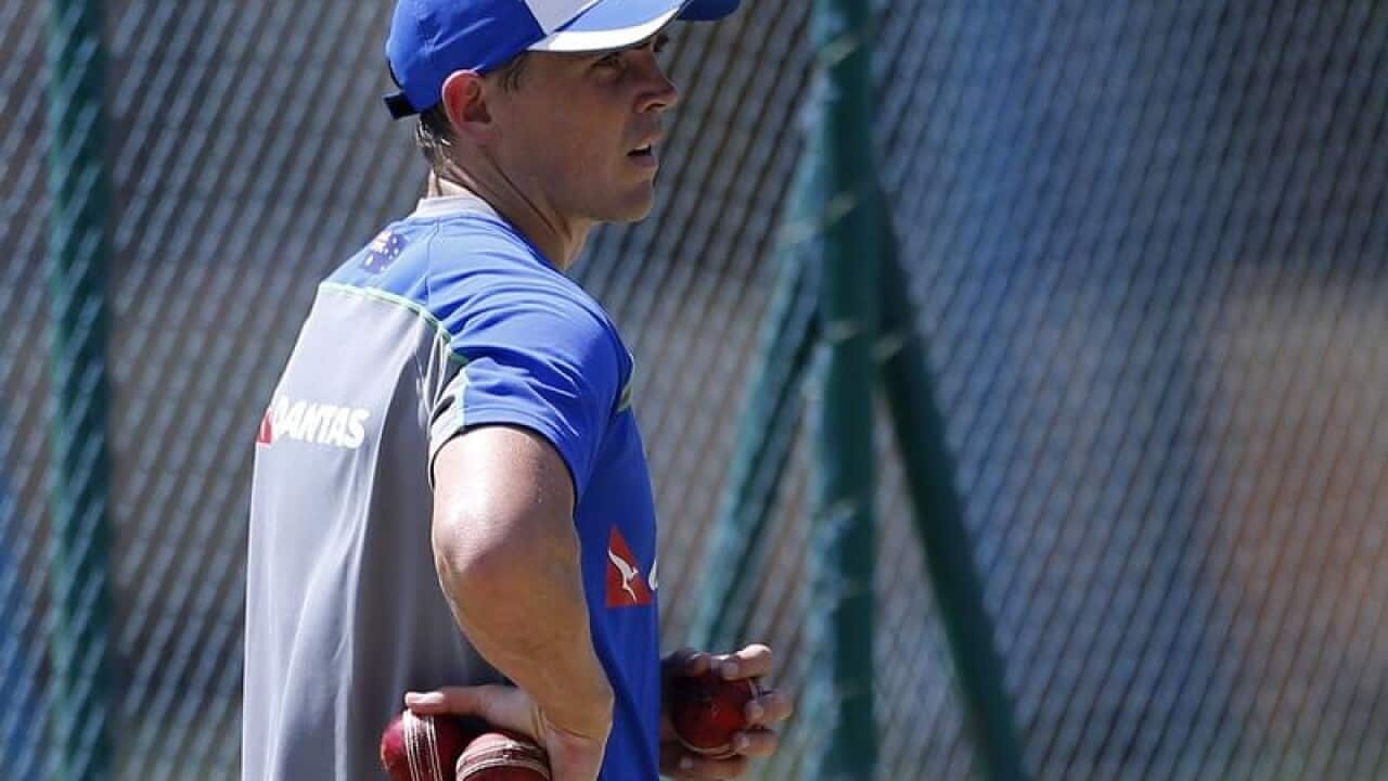 Australia's Steve O'Keefe looks on