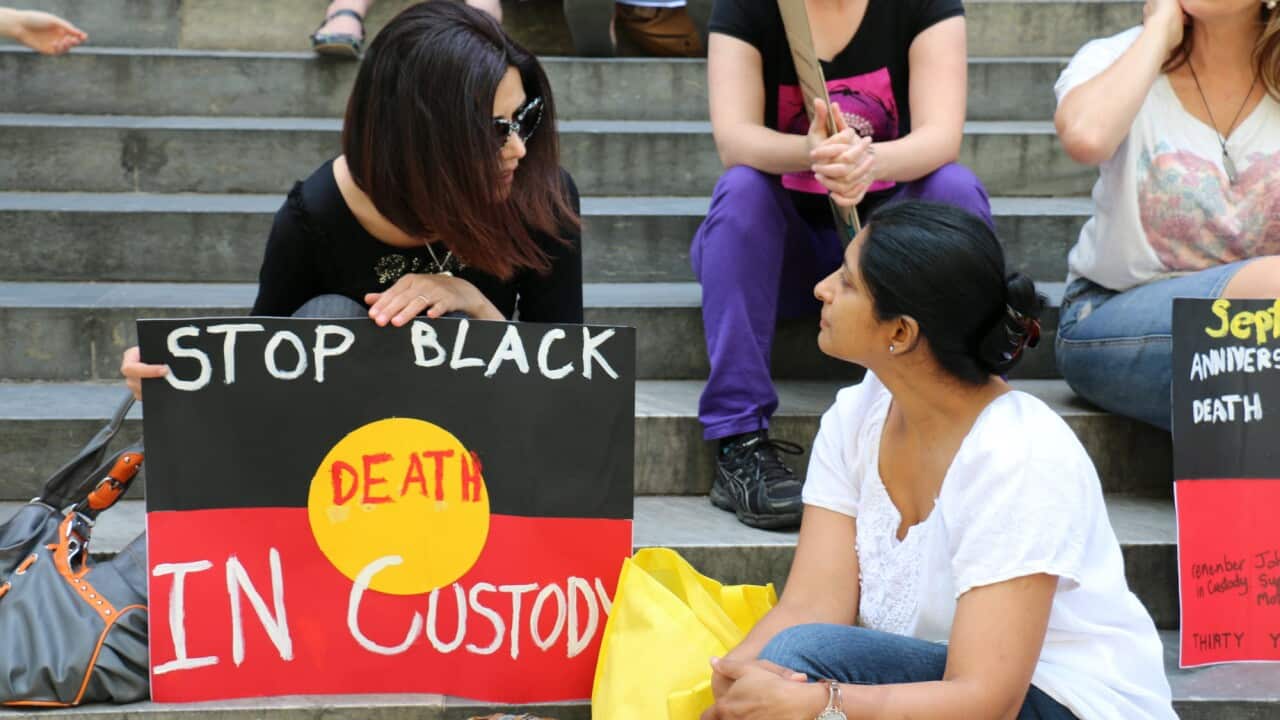 Protesters on the steps of Parliament House in Adelaide demanding an independent inquest into the death of 22-year-old Yamatji woman, Julieka Dhu (AAP)