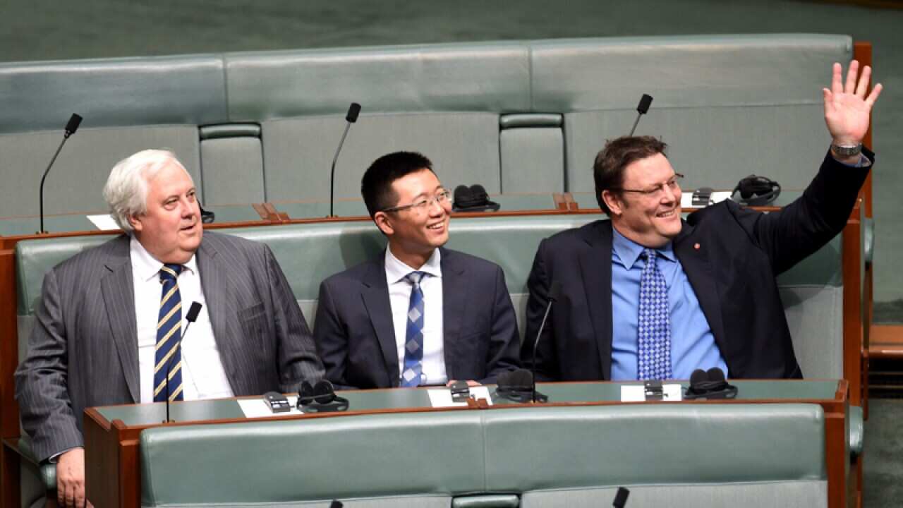 (L-R) Clive Palmer and senators Dio Wang and Glenn Lazarus