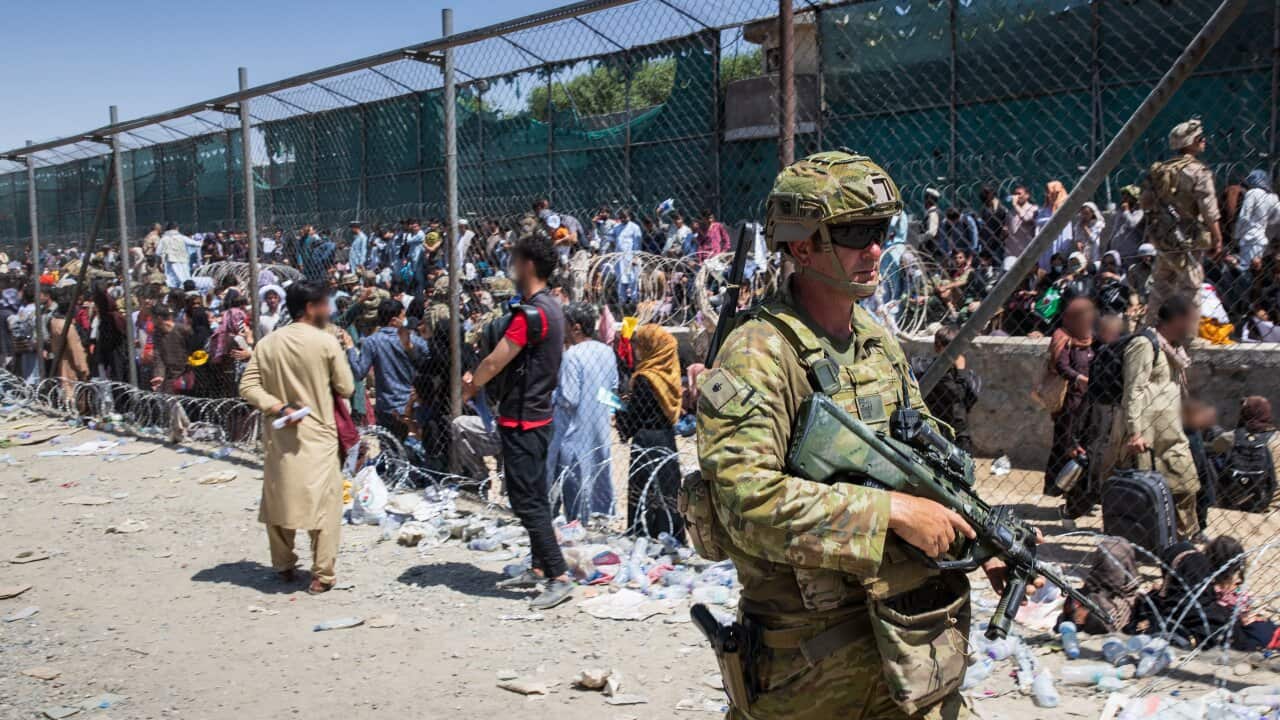 ready combat team assisting the Department of Foreign Affairs and Trade with locating Afghan Australian visa holders attempting to enter the congested Abbey Gate at Hamid Karzai International Airport in Kabul, Afghanistan, Friday, August 27, 2021. (AAP Im
