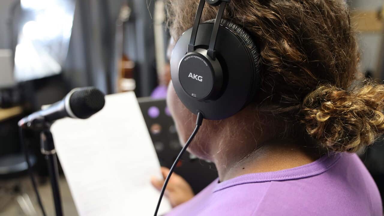 Women prisoners have teamed up with Midnight Oil to perform songs in traditional language