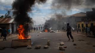 People protest in the streets of Arusha, Tanzania