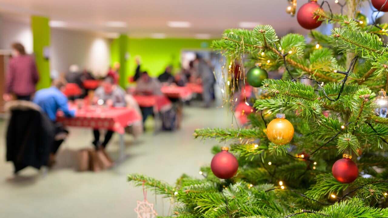 Bishop Fehrs on Christmas Eve with homeless people