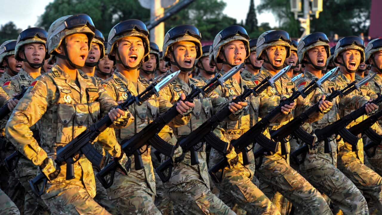 People's Liberation Army) soldiers march past the Tian'anmen Rostrum during the military parade to commemorate the 70th anniversary of the victory in the Chinese People's War of Resistance Against Japanese Aggression in Beijing