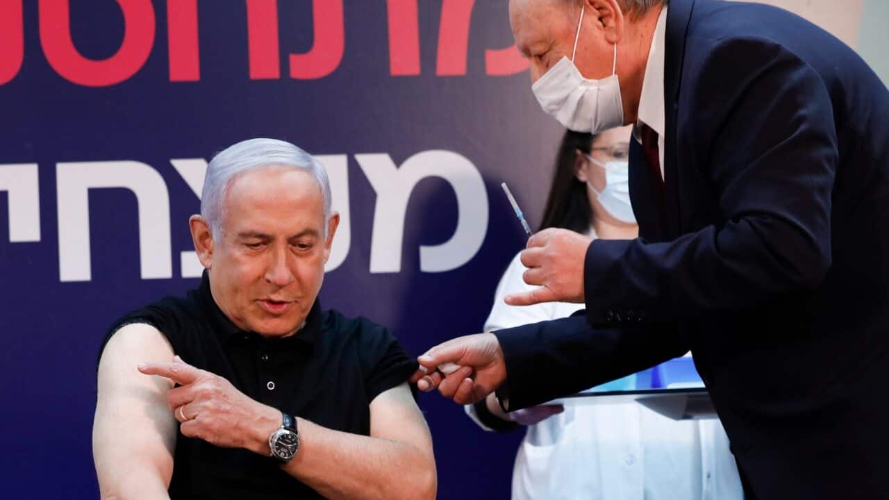 Israeli Prime Minister Minister Benjamin Netanyahu gets ready to receive a coronavirus vaccine at Sheba Medical Center on 19 December 2020.