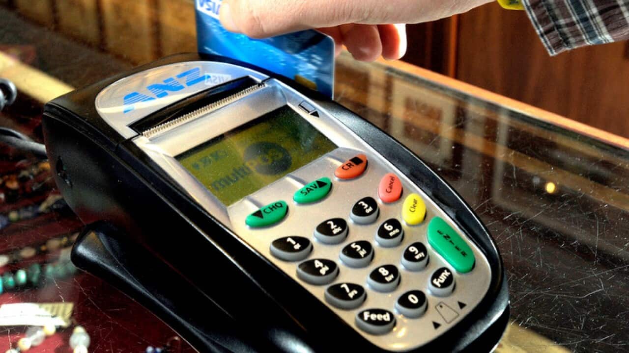 A debit card being swiped through an EFTPOS machine in Canberra 