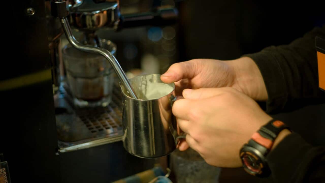 a migrant coffee shop owner