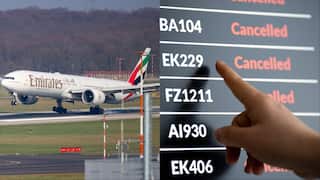 A composite of a plane and a screen displaying cancelled flights