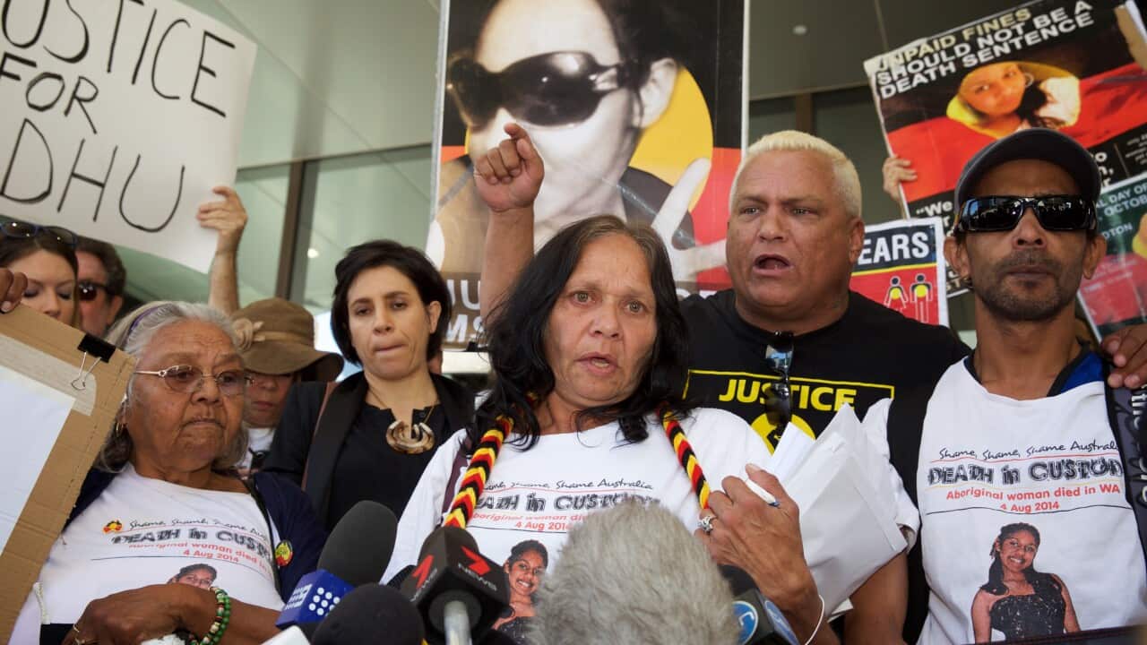 Carol Roe grandmother (L) and Della Roe (C), mother of Ms Dhu outside the coroner's court in Perth on Friday, Dec. 16, 2016.