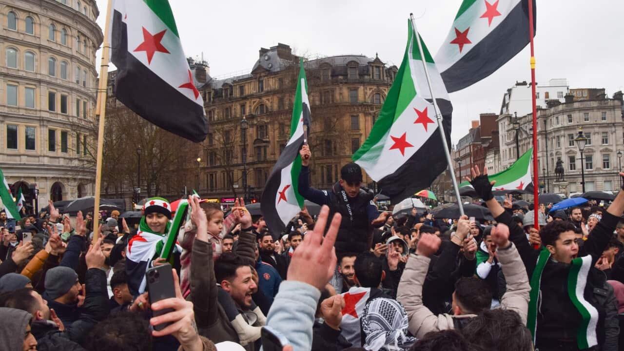 Syrians celebrate the toppling of Bashar al Assad regime in Trafalgar Square, London, UK - 08 Dec 2024