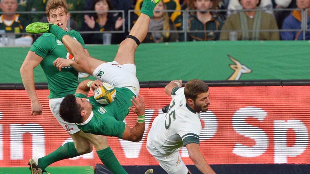 Tiernan O Halloran of Ireland upended by Willie le Roux