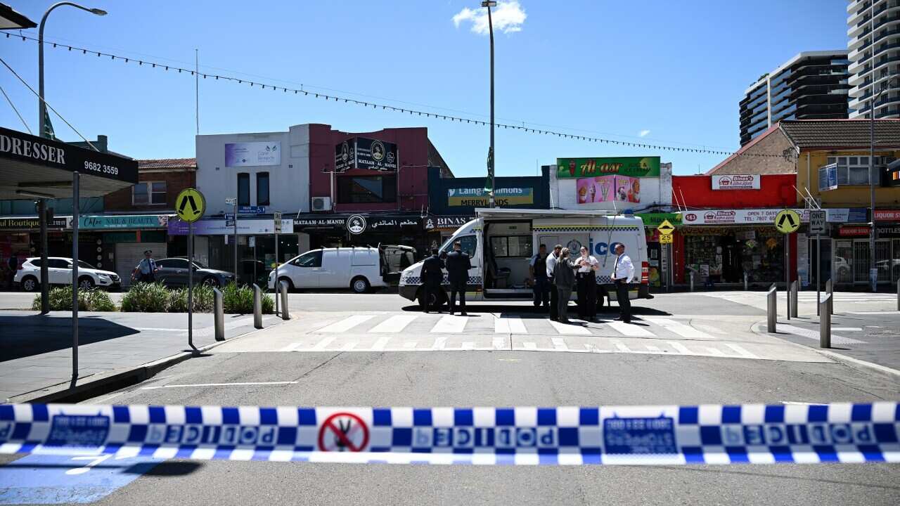 NSW Police, detectives, and forensics at the scene of a triple stabbing in Merrylands, Sydney